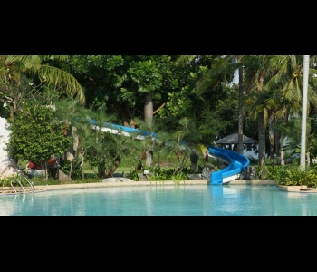 Water slide in big pool